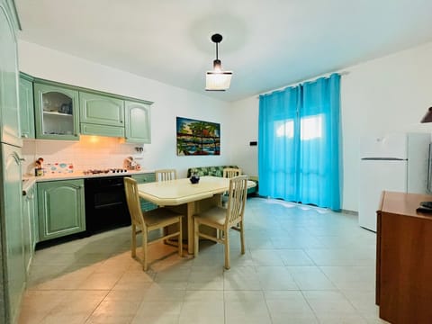 Apartment, 3 Bedrooms | Living area | 22-inch TV with cable channels