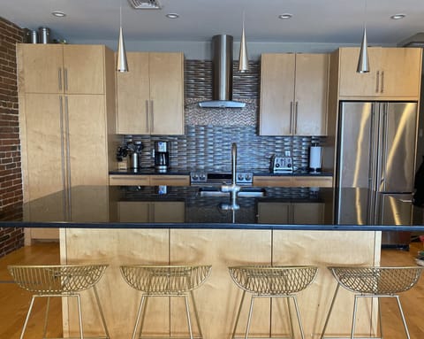 Large eat up island in this beautiful modern kitchen 
