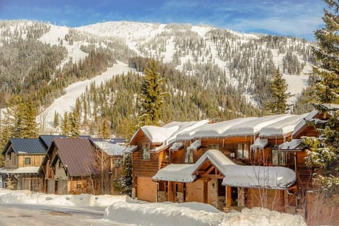 Exterior of the property during winter with amazing view of Whitefish Mountain Resort