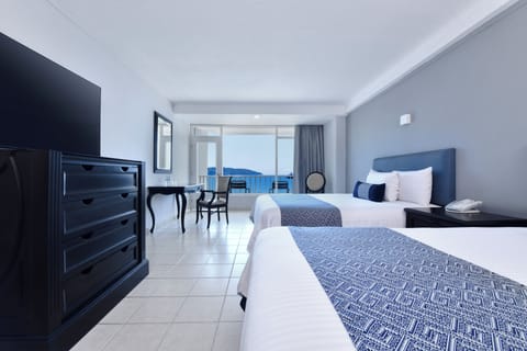 Standard Ocean View | Down comforters, in-room safe, blackout drapes, iron/ironing board