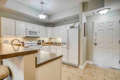 The kitchen is quite spacious, providing ample room for meal preparation.