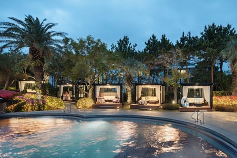 Outdoor pool, open 10:00 AM to 9:30 PM, cabanas (surcharge)
