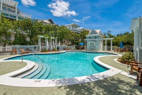 Large community pool only steps from the homes backdoor!