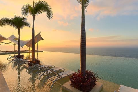 2 outdoor pools, sun loungers