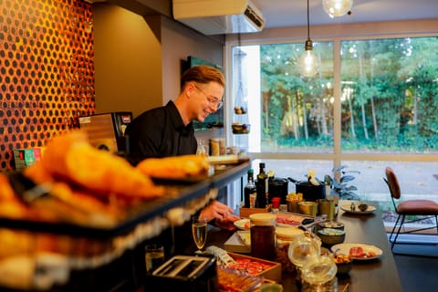 Daily buffet breakfast (EUR 15 per person)