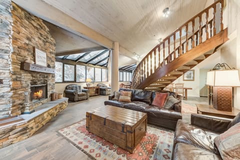 Living Area with Fireplace and Spiral Staircase