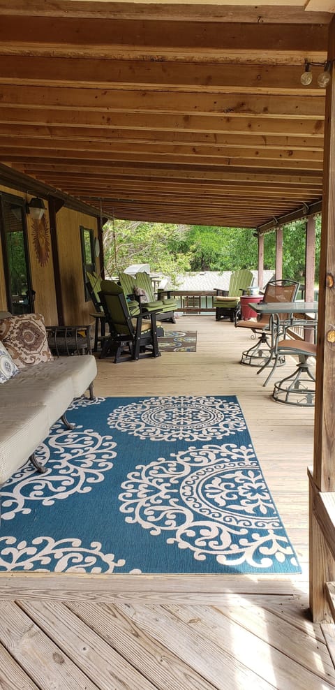 Lots of seating on this large porch. Propane grill available.