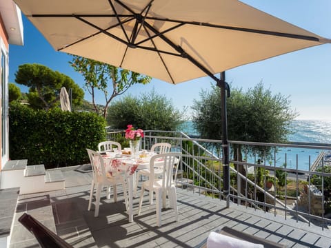 Property, Plant, Furniture, Sky, Water, Table, Tree, Chair, Shade, Outdoor Furniture