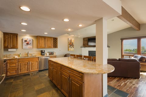 Kitchen, Bar and Main Living Space