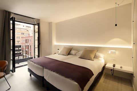 Double Room | Minibar, in-room safe, desk, laptop workspace
