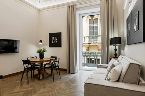 Apartment, 1 Bedroom | Living area | Smart TV