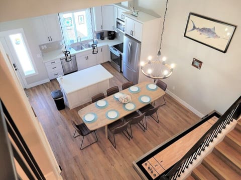 View of kitchen from 2nd floor stairs