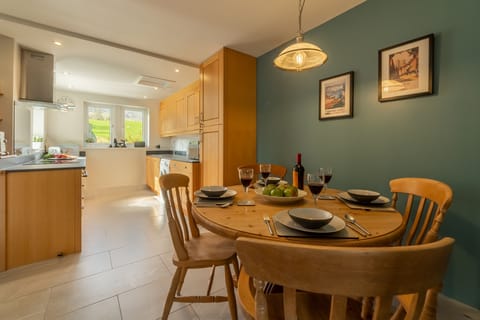 Ground floor: Kitchen with dining area seating four guests