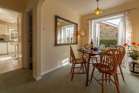 Ground floor: Dining room and French doors leading to the garden