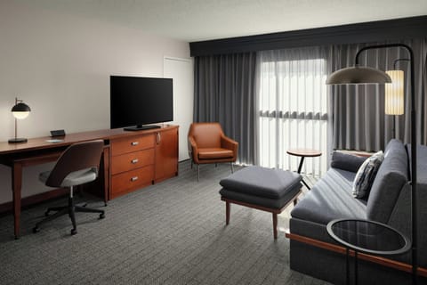 Suite, 1 Bedroom | Living room | 43-inch flat-screen TV with cable channels, TV