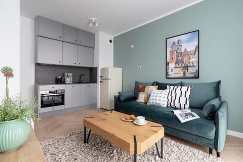 Relax in the stylish living room with a comfortable sofa and modern decor.