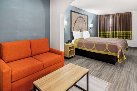 Room, 1 King Bed, Accessible, Non Smoking (Mobility/Hearing, Roll-In Shower) | Desk, laptop workspace, blackout drapes, iron/ironing board