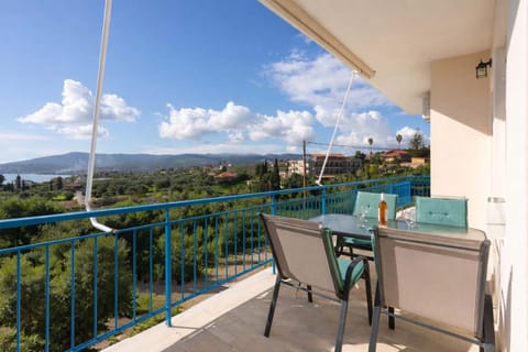 Private Balcony with Outdoor Seating and Open Views
Spacious private balcony with table and chairs, ideal for relaxing and enjoying the surrounding views.