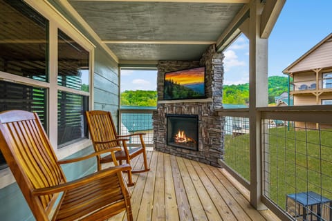 Relax and unwind with the charm of our porch fireplace, perfect for relaxing in front of after soaking in the hot tub.