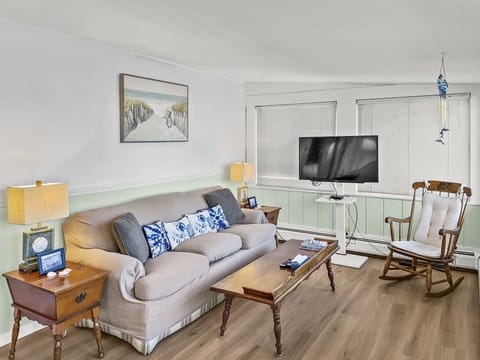 Front porch with couch and flat screen TV -  25 Zylpha Rd Harwich Port- Cape Cod- New England Vacation Rentals