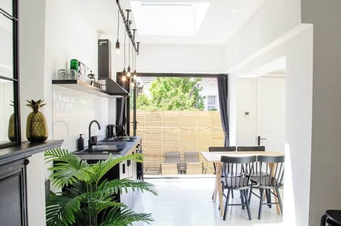 Savor the fusion of dining and cooking in our inviting kitchen-dine area.