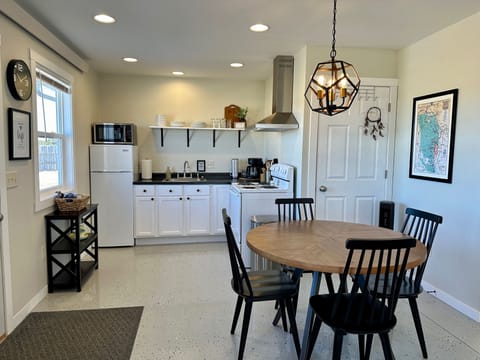 View of kitchen and dinning area from living room.