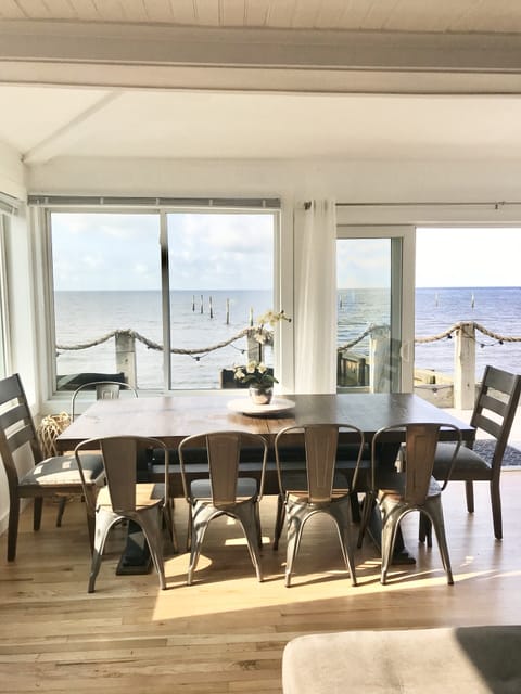 Dining area overlooking private beachfront