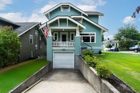 Front view of house with driveway for higher clearance vehicles