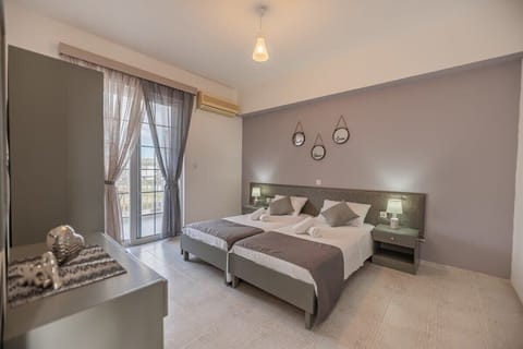 Interior Space – Bedroom Area – Bright and calm bedroom with double bed and soft décor.