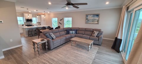 Living Room w/ Queen Sleep Sectional & 75-Inch Smart TV