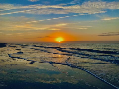 Sunrise on the beach in front of our condo! 