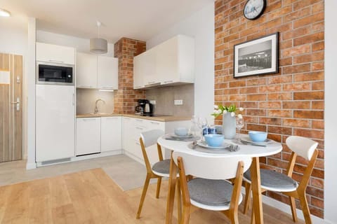 Kitchenette with dining table.