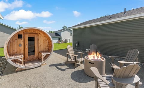 Outdoor gas firepit, patio, and shared sauna space