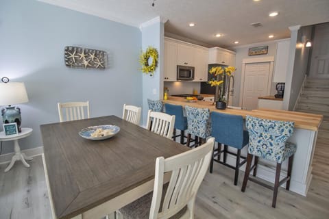 The open concept living, dining and kitchen