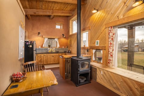 Living space with dining area and wood fireplace