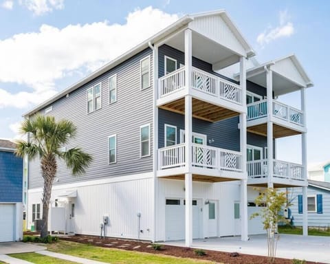 Three Seas at the B- 3 level brand new reverse floorplan condo with two private patios 