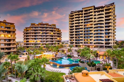 Aerial view of the Bella Sirena resort luxury living with pools, palm trees, and panoramic Sea of Cortez vistas.
