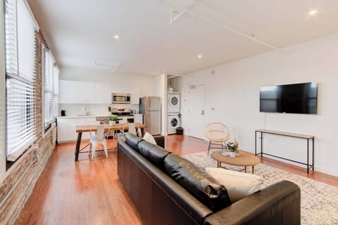 Washer and dryer beside the fridge.