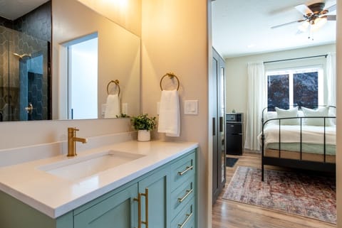 View of bed from bathroom