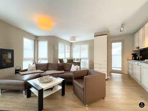 Strandvilla Baabe 22 - Meeresrauschen | Living area | Flat-screen TV, fireplace, DVD player, heated floors