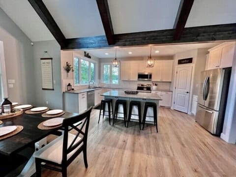 Fully stocked Kitchen with all the amenities. Extra refrigerator/freezer in laundry room.