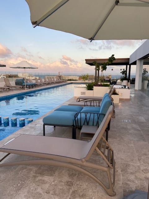 Take in ocean breezes and watch the sunset from any of of the rooftop pools