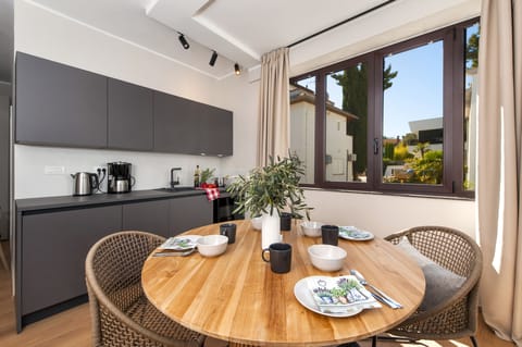 Deluxe Apartment, 1 Bedroom | Private kitchen | Coffee/tea maker, electric kettle