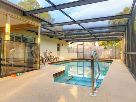 Heated salt-cell pool with child safety gate
