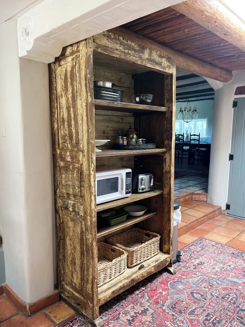 Kitchen hutch with spices and microwave