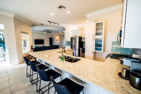 Large open kitchen with tons of cabinetry. (2)