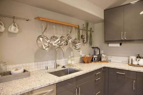 Fully stocked kitchen complete with small ample small appliances and cookware