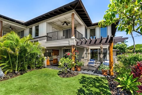 Two-story, corner unit with extra large lanai area, overlooking golf course. 