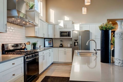 The kitchen offers so many amenities for you to cook a meal together. We have a toaster, blender, slow cooker, spices etc. We have additional items for your use: mop, bucket, kitchen towels, hot pads, and dish soap.