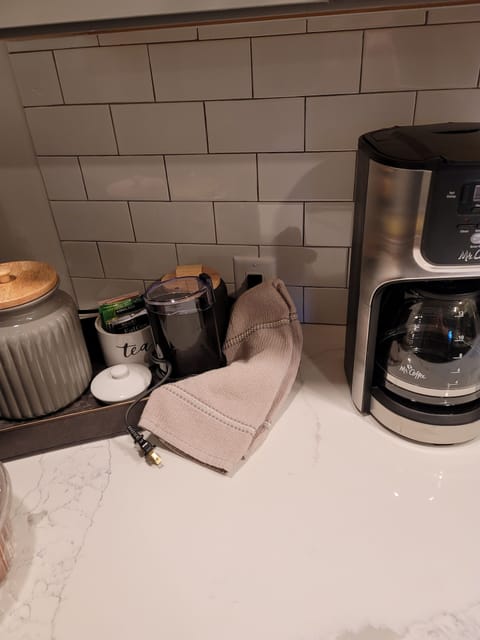 Whole bean coffee and grinder provided. some tea as well.